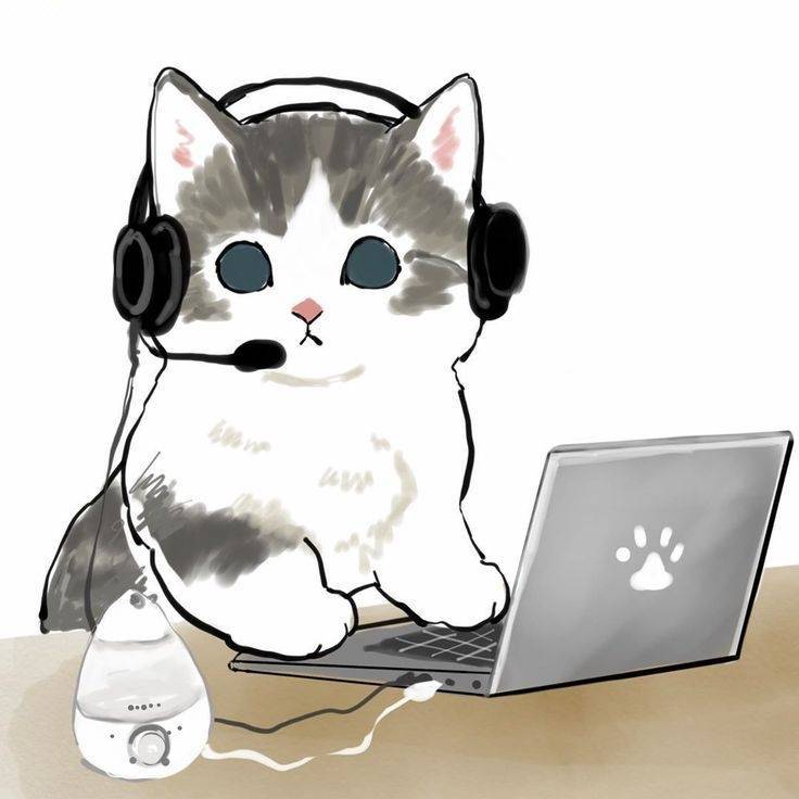 a cute cat sitting in front of a laptop with a headset and microphone